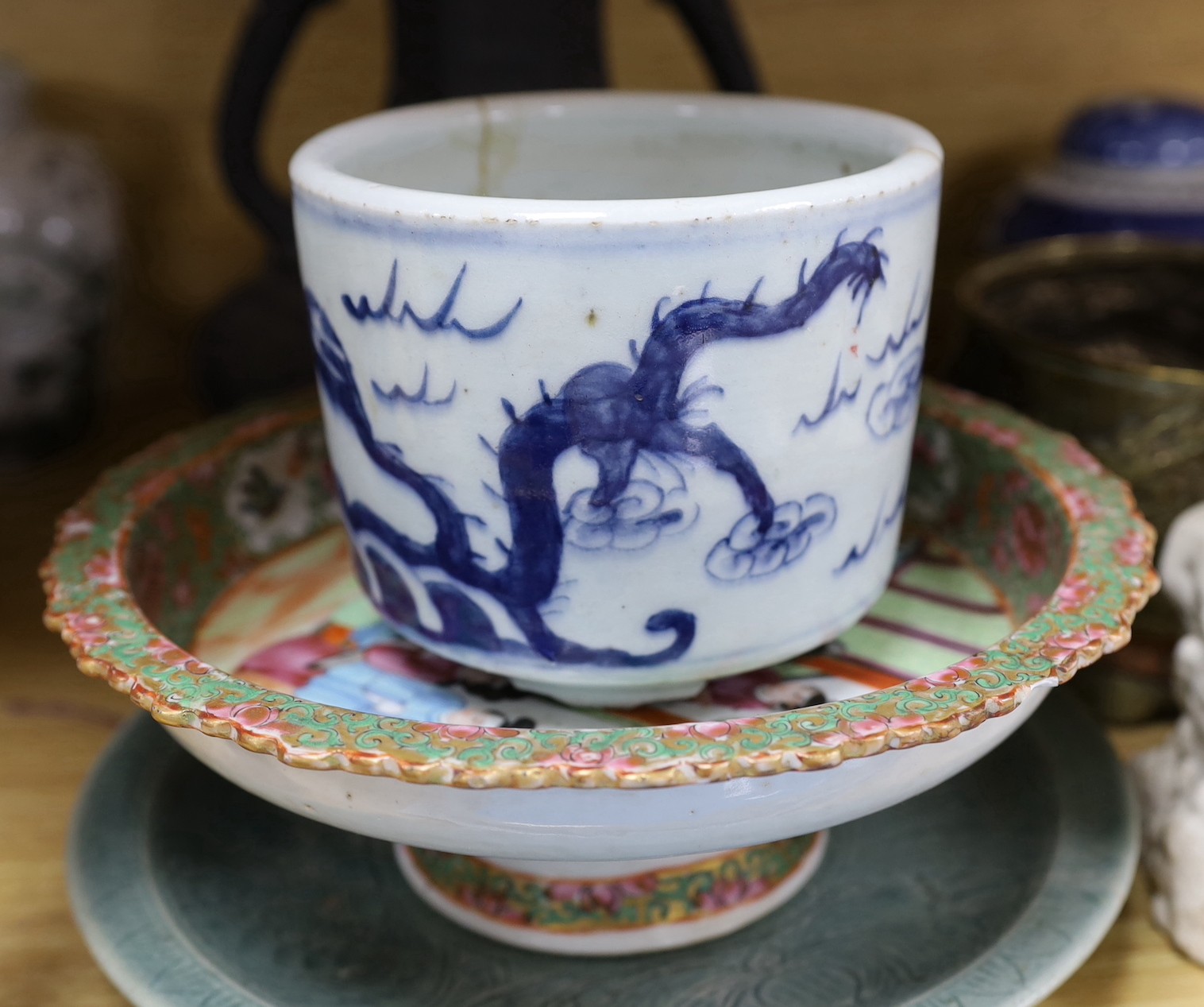 A Chinese blue and white planter, 10cm tall, together with a crackle glaze planter, a Chinese copper and brass jardiniere, a faux bronze type vase, a Chinese famille rose pedestal dish, 23cm, a Thai celadon dish, and a b